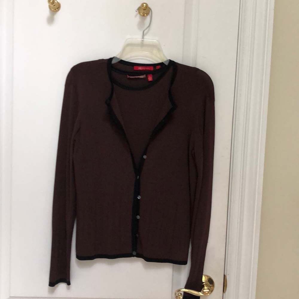 Twin cardigan set in brown with black trim border.